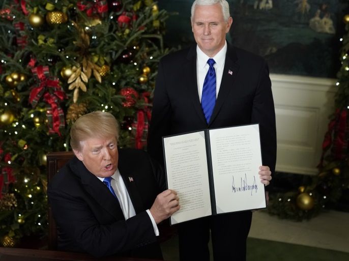 blogs - U.S. President Donald Trump shows off an executive order recognizing Jerusalem as the capital of Israel after signing it with Vice President Mike Pence at his side in the Diplomatic Reception Room of the White House in Washington, U.S., December 6, 2017. REUTERS/Jonathan Ernst