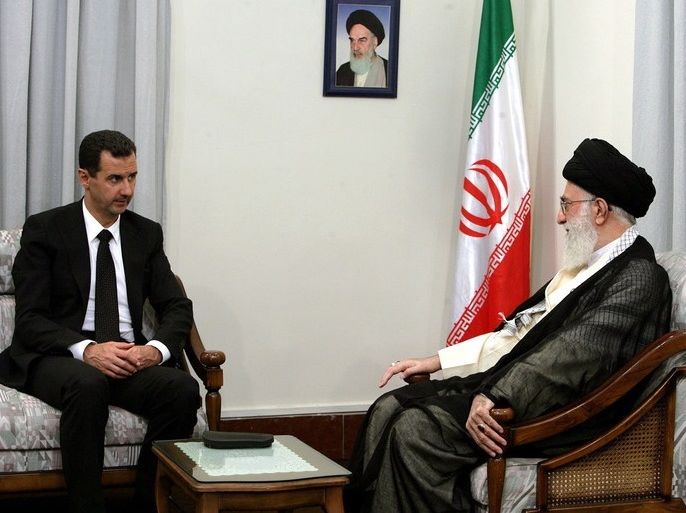 epa01829056 Iran’s supreme leader Ayatollah Ali Khamenei (R) speaks to Syrian President Bashar al-Assad on 19 August 2009 at the leader's office in Tehran, Iran. In his fourth visit to Tehran since Mahmoud Ahmadinejad became president in 2005, Assad reportedly wants to mediate between Tehran and Paris for the return home of French lecturer Clotilde Reiss who was arrested by Iranian authorities and charged with participation in the opposition demonstrations. EPA/STRINGE
