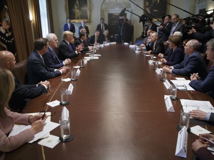 epa06571524 US President Donald J. Trump delivers remarks during a meeting with bipartisan Members of Congress to discuss school and community safety in the Cabinet Room of the White House in Washington, DC, USA, 28 February 2018. EPA-EFE/SHAWN THEW