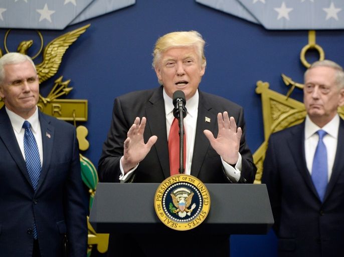epa06137597 (FILE) - US President Donald J. Trump (C) speaks in the Hall of Heroes at the Pentagon in Arlington, Virginia, USA, 27 January 2017 (reissued 11 August 2017), as US Secretary of Defense James Mattis (R) and US Vice-President Mike Pence (L) look on. President Trump said on 11 August 2017, that the US military was 'locked and loaded' warning North Korea of military solutions in case Pyongyang should 'act unwisely.' The latest remark came amid increasing te