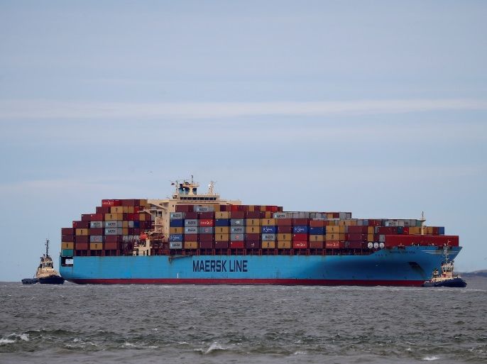 The Maersk Line container ship Maersk Sentosa is helped by tugs as it navigates the River Mersey in Liverpool, Britain, July 31, 2018. REUTERS/Phil Noble