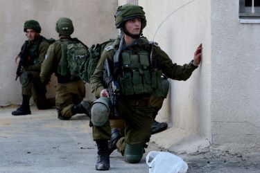 Israeli forces intervene in a protest in Hebron- - HEBRON, WEST BANK - DECEMBER 14: Israeli forces intervene in a protest against the Israeli raids to Palestinians' homes in Hebron, West Bank on December 14, 2018.