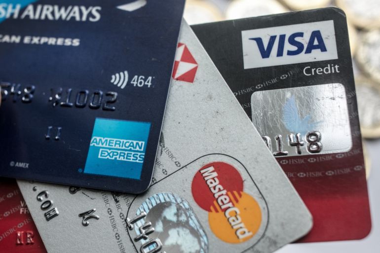 BRISTOL, ENGLAND - NOVEMBER 03: In this photo illustration credit debit cards are seen on November 3, 2017 in Bristol, England. The Bank of England raised interest rates from a historic low for the first time in ten years this week raising costs of lending and concerns for householder debt. (Photo by Matt Cardy/Getty Images)