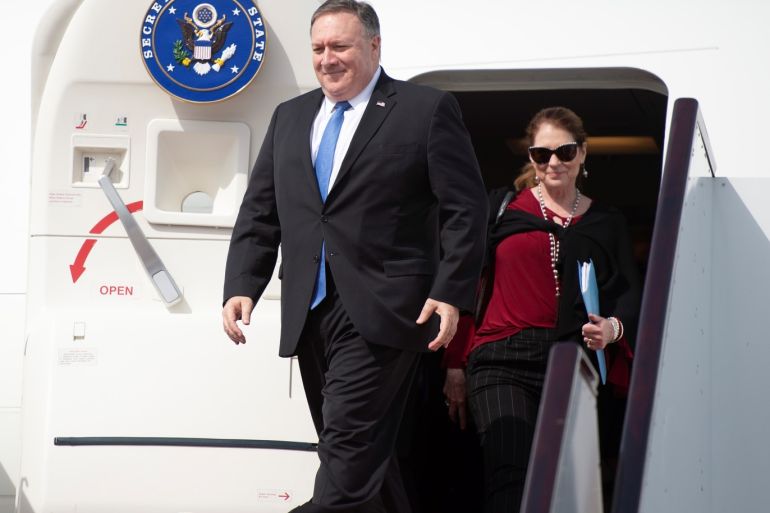 U.S. Secretary of State Mike Pompeo and his wife Susan look on as they arrive in Doha International Airport in Doha, Qatar January 13, 2019. Andrew Caballero-Reynolds/Pool via Reuters