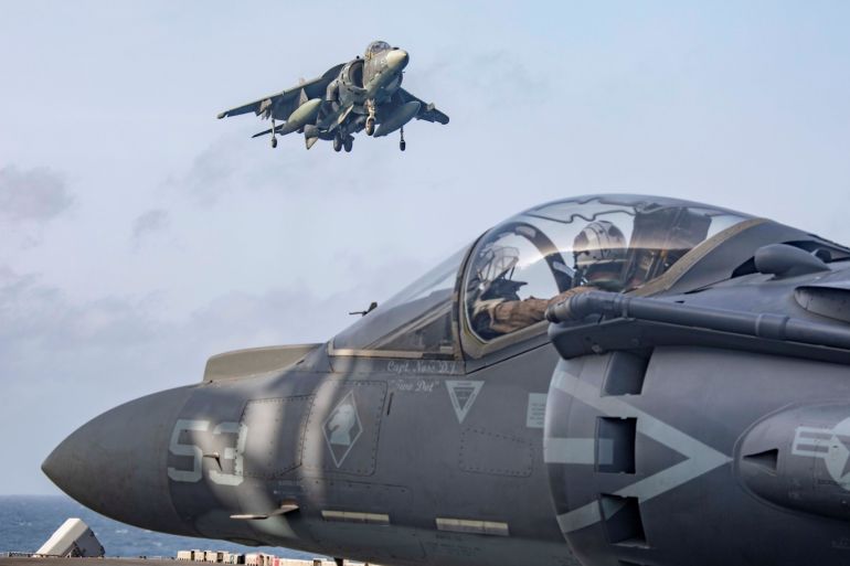 U.S. Marine Corps AV-8B Harriers return to the flight deck of the U.S. Navy Wasp-class amphibious assault ship USS Kearsarge after participating in an exercise with F/A-18E Super Hornets embarked aboard the Nimitz-class aircraft carrier USS Abraham Lincoln in the Arabian Sea May 18, 2019. Picture taken May 18, 2019. U.S. Navy/Mass Communication Specialist 2nd Class Megan Anuci/Handout via REUTERS. ATTENTION EDITORS - THIS IMAGE WAS PROVIDED BY A THIRD PARTY