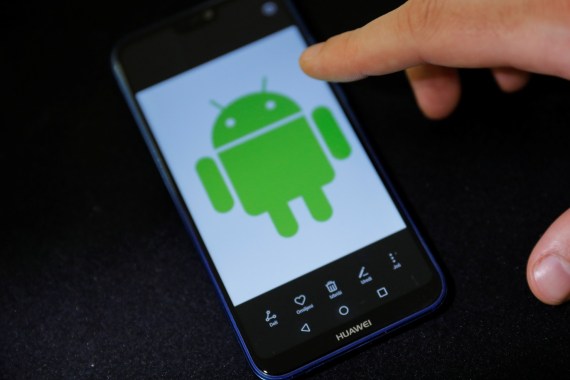 Android logo is displayed on a Huawei smartphone in this illustration picture May 20, 2019. REUTERS/Marko Djurica/Illustration