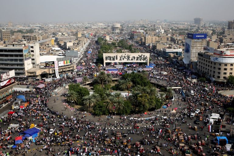 Anti government protests in Iraq- - BAGHDAD, IRAQ - NOVEMBER 03: Protestors gather to attend ongoing anti-government demonstrations economic reforms and overhaul of the political system, at Tahrir Square in Baghdad, Iraq Baghdad on November 03, 2019. The escalation is part of a civil disobedience campaign waged by protesters to pile pressure on the Iraqi government to fulfill their demands.