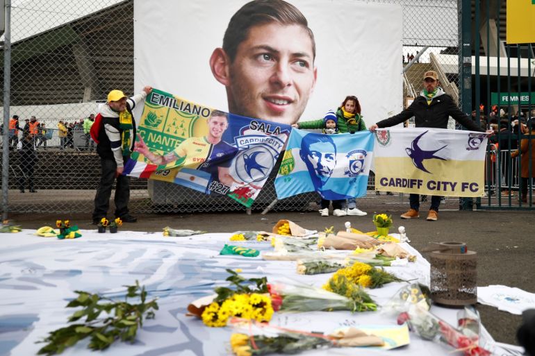 Soccer Football - Ligue 1 - Nantes v Bordeaux - The Stade de la Beaujoire - Louis Fonteneau, Nantes, France - January 26, 2020 General view of fans looking at tributes left outside the stadium in memory of Emiliano Sala to mark the one year anniversary REUTERS/Stephane Mahe