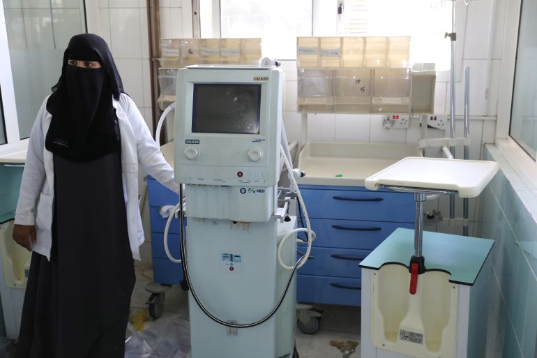 A doctor stands by an old ventilator during the installation of new ventilators,at the intensive care ward of a hospital allocated for coronavirus patients in preparation for any possible spread of the coronavirus disease (COVID-19), in Sanaa