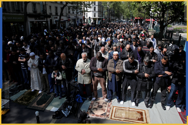 Muslims pray during Friday prayers in the street in front of the city hall of Clichy, near Paris, France, April 21, 2017, after an unauthorised place of worship was closed by local authorities. REUTERS/Benoit Tessier