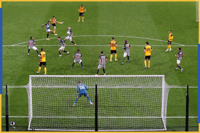 epa08773580 Raul Jimenez (from top, 2nd player in yellow) of Wolverhampton scores the opening goal during the English Premier League match between Wolverhampton Wanderers and Newcastle United in Wolverhampton, Britain, 25 October 2020. ...