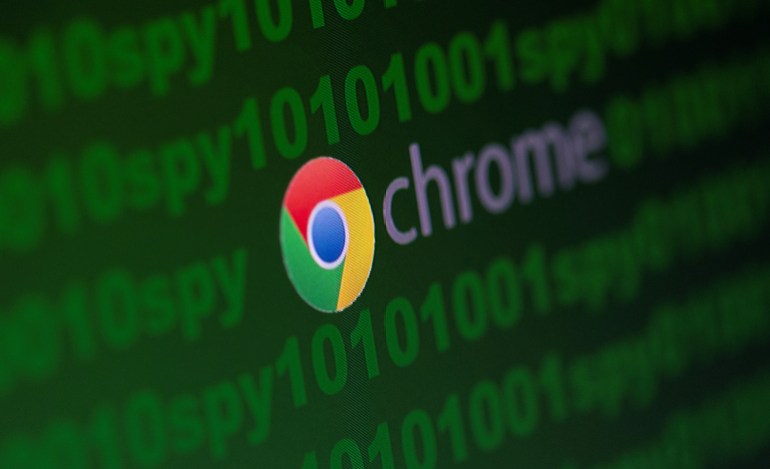 Google Chrome logo is seen near cyber code and words "spy" in this illustration picture