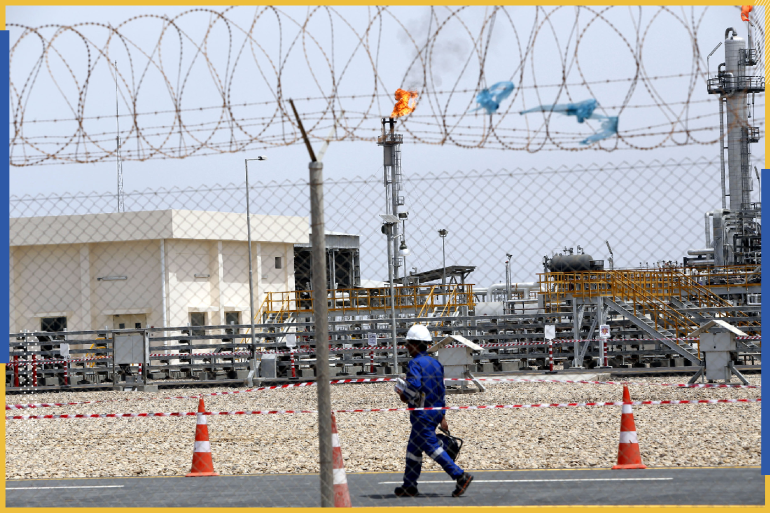 epa06691907 An Iraqi oil worker walks at the al-Siba Gas Field, 30kms south-east of Basra city, southern Iraq, 25 April 2018. The al-Siba field is the first field in Iraq for producing natural gas, which is being developed by Kuwait Energy...