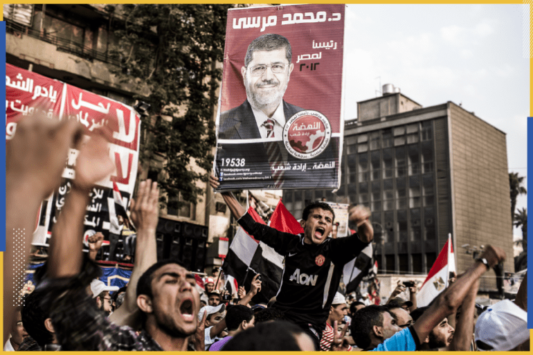 CAIRO, EGYPT - JUNE 23: Supporters of Mohamed Morsi, the Muslim Brotherhood's candidate, protest against Egypt's military rulers in Tahrir Square and celebrate a premature victory on June 23, 2012 in Cairo, Egypt. Egyptian election officials have postponed the announcement of a winner in last weekend's presidential run-off, stating they needed more time to evaluate charges of electoral abuse that could affect who becomes the country's next president. The official result is expected tomorrow on June 24. (Photo by Daniel Berehulak /Getty Images)