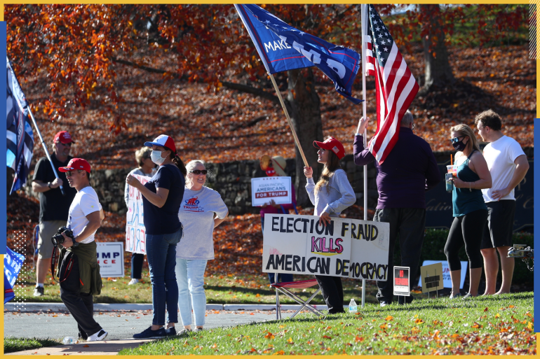Supporters of President Trump display signs of protest against election fraud ahead of the departure of the presidential motorcade with U.S. President Donald Trump at the Trump National Golf Club in Sterling, Virginia, U.S., November 8, 2020. REUTERS/Tom Brenner