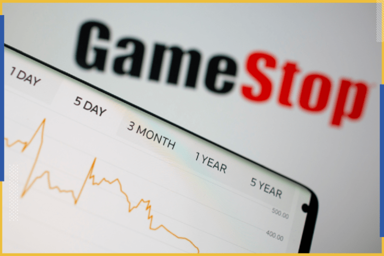 GameStop stock graph is seen in front of the company's logo in this illustration taken February 2, 2021. REUTERS/Dado Ruvic/Illustration