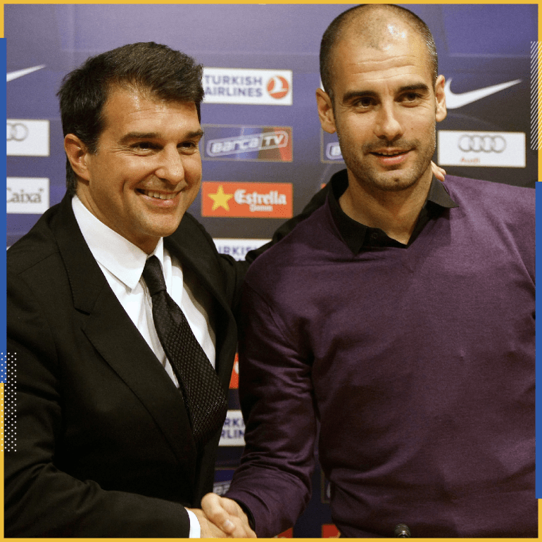 Barcelona president Joan Laporta (L) shakes hands with coach Pep Guardiola after a news conference at Nou Camp stadium in Barcelona January 20, 2010. Barcelona coach Guardiola has agreed to extend his contract with the European and Spanish champions by one year until the end of next season. REUTERS/Gustau Nacarino (SPAIN - Tags: SPORT SOCCER)