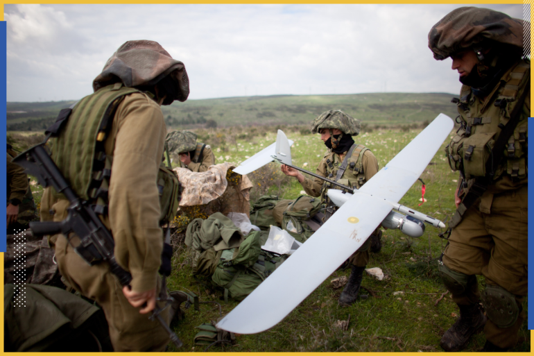 BAT SHLOMO, ISRAEL - JANUARY 16: (ISRAEL OUT) Israeli soldiers get ready to launch the Skylark drone during a drill on January 16, 2012 near Bat Shlomo, Israel. The Skylark can carry a camera payload of up to 1kg, has an operational calking of 15,000ft and allows users to monitor any designated point within a 15km radius. The Skylark unit consists of a ground control element and three drones, which provide battalion-level commanders with real-time information. (Photo by Uriel Sinai/Getty Images)