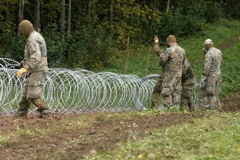 Latvian army start to build temporary barbed wire fence on the Latvian-Belarus border near Robeznieki