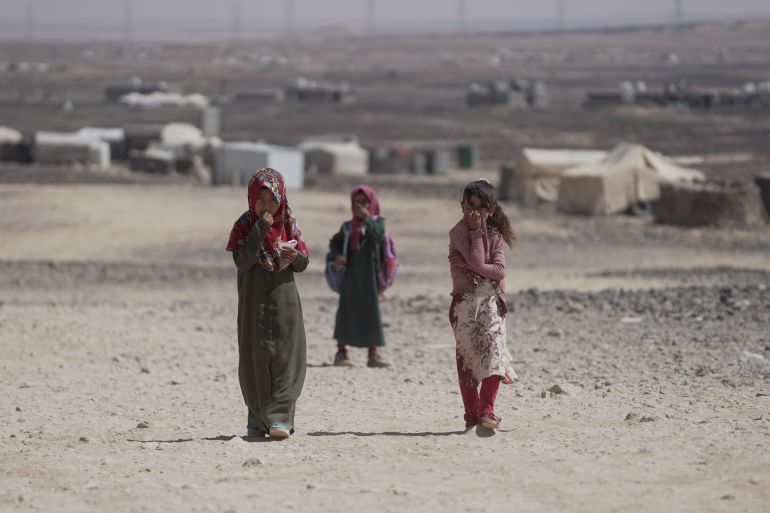 Girls return from their school at a camp for internally displaced persons (IDPs) in Marib, Yemen November 3, 2021. Picture taken November 3, 2021. REUTERS/Nabeel al-Awzari NO RESALES. NO ARCHIVES