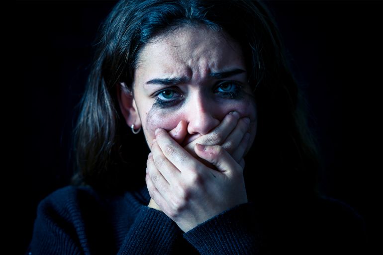 Dramatic closeup portrait of young scared, depressed girl crying alone, feeling hopeless suffering from harassment or domestic violence. Stop child abuse and neglect. Social campaign concept.; Shutterstock ID 1335893288; purchase_order: ajnet; job: ; client: ; other: