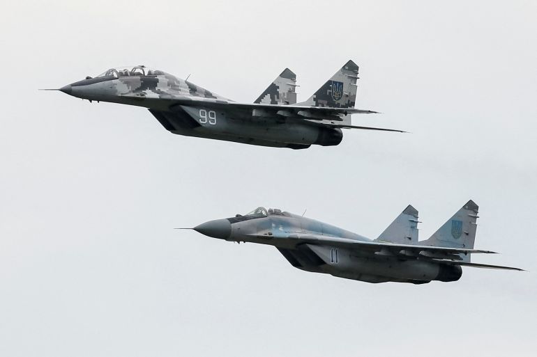FILE PHOTO: MIG-29 fighter aircrafts fly at a military air base in Vasylkiv, Ukraine, August 3, 2016. REUTERS/Gleb Garanich/File Photo