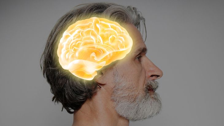 Thinking concept, space for text. Mature man and illustrated brain on grey background; Shutterstock ID 1716196099; purchase_order: A; job: ; client: ; other: