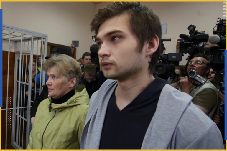 Ruslan Sokolovsky, a blogger who is accused by a state prosecutor for playing Pokemon Go inside an Orthodox church, appears with his mother Yelena Chingina in a court during his sentencing in Yekaterinburg, Russia May 11, 2017. REUTERS/Alexei Kolchin