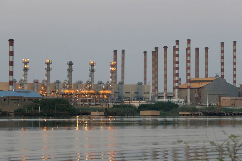 FILE PHOTO: FILE PHOTO: A general view of Abadan oil refinery in southwest Iran, is pictured from Iraqi side of Shatt al-Arab in Al-Faw south of Basra, Iraq September 21, 2019. REUTERS/Essam Al-Sudani/File Photo