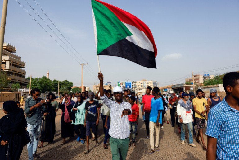 Protesters gather during a rally against military rule in Khartoum North
