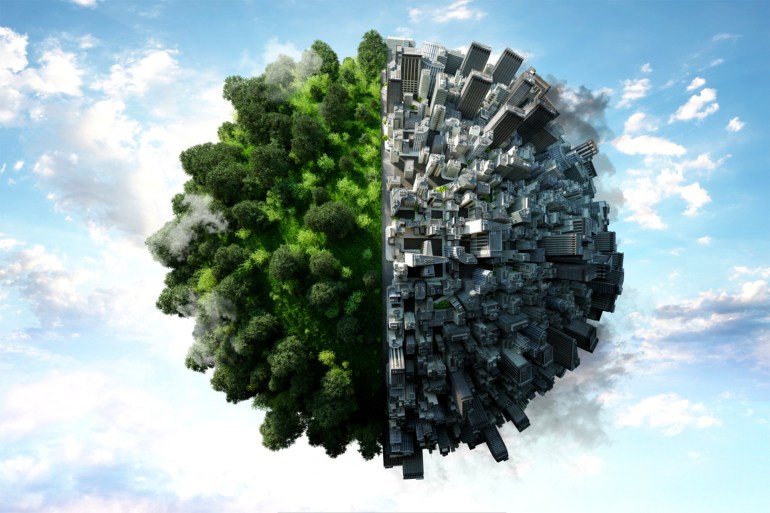 Parallel world - stock photo Digital generated image of two semi spheres connected together in one planet. Left part covered by trees against right part fully urban and covered by buildings. Sustainability concept Getty. 1340683804