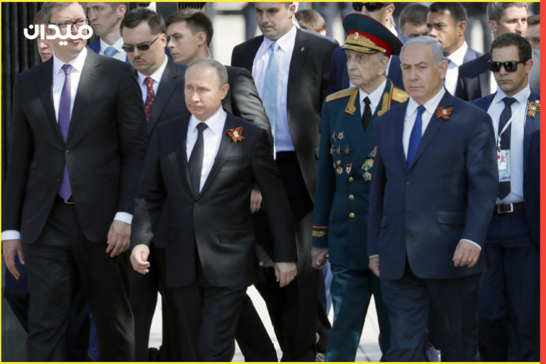 epa06723066 Serbian President Aleksandar Vucic (L), Israeli Prime Minister Benjamin Netanyahu (C) and Russian President Vladimir Putin (2-R) carry portraits of their relatives who fought in the World War II, during an Immortal Regiment memorial march in Moscow, Russia, 09 May 2018. Russia marks the 73rd Victory Day anniversary over Nazi Germany in World War II. EPA-EFE/ALEXEI DRUZHININ / SPUTNIK / KREMLIN POOL / POOL MANDATORY CREDIT