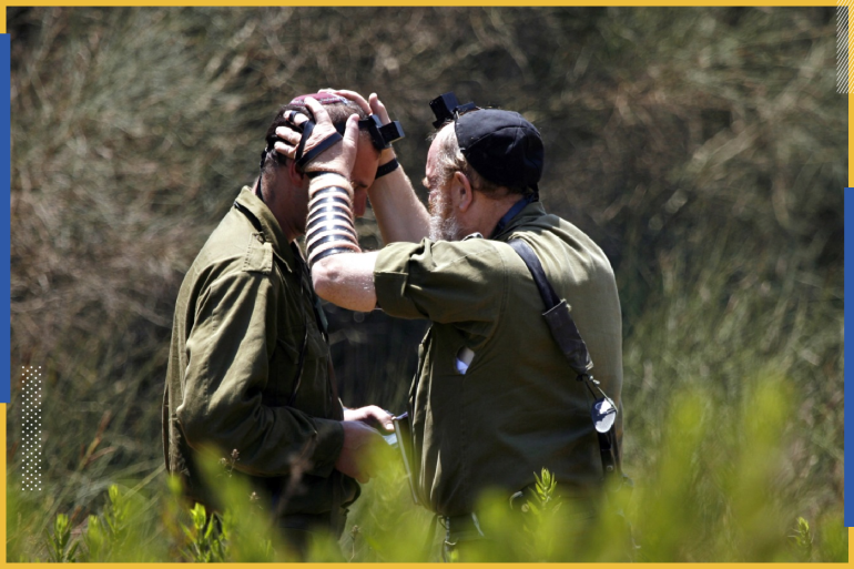 حاخام إسرائيلي في الجيش (رويترز)