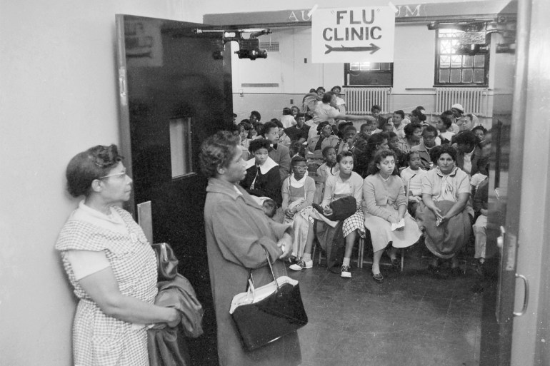 Patients Waiting at Flu Clinic (Original Caption) Ill persons fearing they have been stricken with Asian flu, wait their turns at Central Harlem District Health clinic here October 3rd. This Clinic was opened to ease the pressure on Harlem Hospital during the epidemic. Health, hospital and welfare officials are urging New Yorkers not to flood the already heavily taxed hospitals with phone calls and visits since the disease is comparatively of a mild nature. GettyImages-514976530