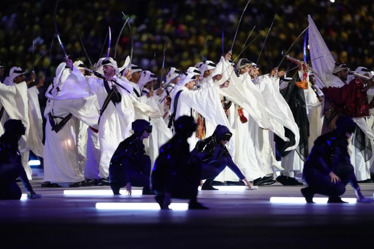 The opening ceremony included a performance of al-Ardha, a traditional sword dance, which was originally a war display but now appears at all kinds of of traditional events. [Sorin Furcoi/Al Jazeera]