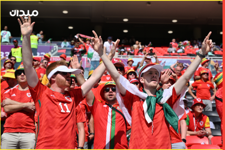 Wales - Iran: FIFA World Cup 2022- - AL-RAYYAN, QATAR - NOVEMBER 25: Fans of Wales prior to the FIFA World Cup Qatar 2022 Group B match between Wales and Iran at Ahmed bin Ali Stadium in Al-Rayyan, Qatar on November 25, 2022.