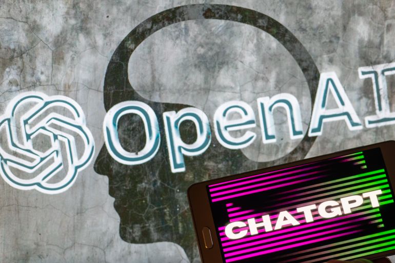 OpenAI logo seen on screen with ChatGPT website displayed on mobile seen in this illustration in Brussels, Belgium, on December 12, 2022. (Photo by Jonathan Raa/NurPhoto via Getty Images) GettyImages-1245565693