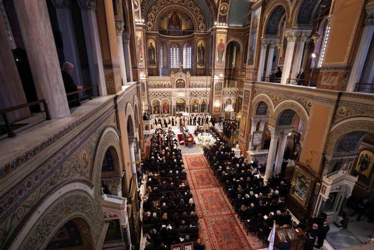 People attend the funeral service of former King of Greece Constantine II in the Metropolitan Cathedral of Athens, Greece, January 16, 2023. REUTERS/Stoyan Nenov/Pool