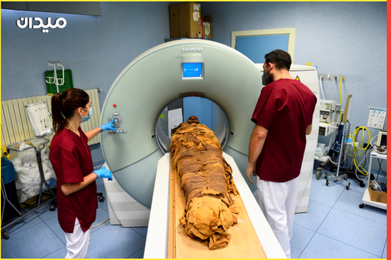 Medical radiology technicians prepares a CT scan to do a radiological examination of an Egyptian mummy in order to investigate its history at the Policlinico hospital in Milan, Italy, June 21, 2021. Picture taken June 21, 2021. REUTERS/Flavio Lo Scalzo