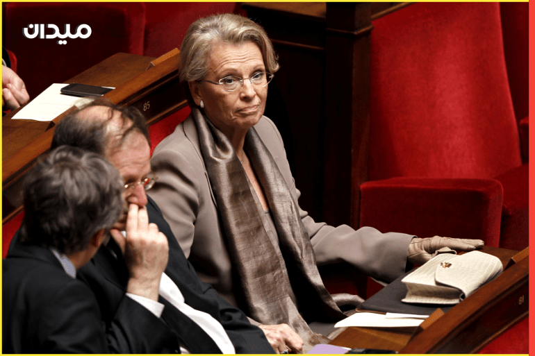 Michele Alliot-Marie (R), former French Foreign Minister and UMP deputy, attends the questions to the government session at the National Assembly in Paris March 30, 2011. REUTERS/Charles Platiau (FRANCE - Tags: POLITICS)
