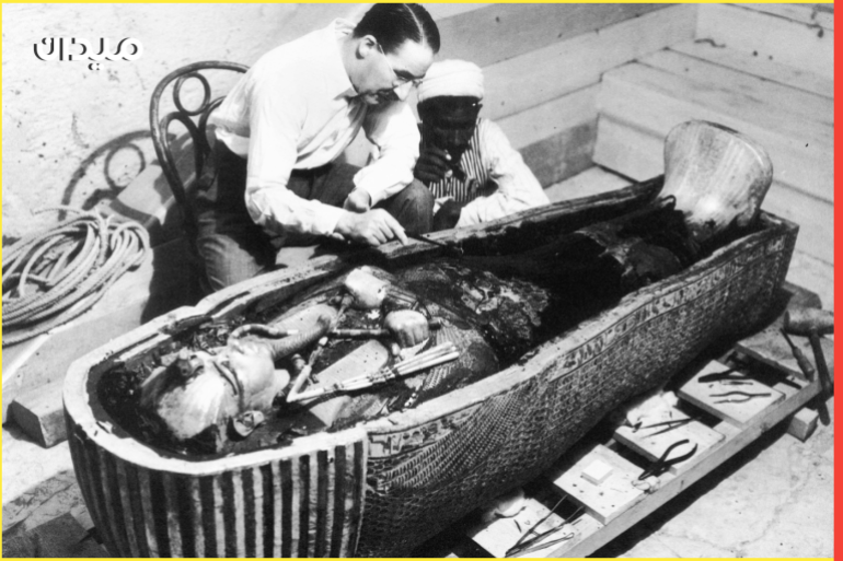 Howard Carter (1873-1939). English Archaeologist. Carter And An Egyptian Assistant Examining The Sarcophagus Of King Tutankhamen, Found During The Excavation Of His Tomb In The Valley Of The Kings, Egypt, October 1925. Photographed By Harry Burton.