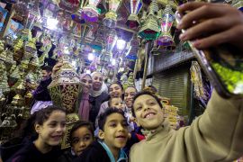 Traditional Ramadan lanterns called "fanous" are displayed for sale at a stall, ahead of the Muslim holy month of Ramadan in Cairo