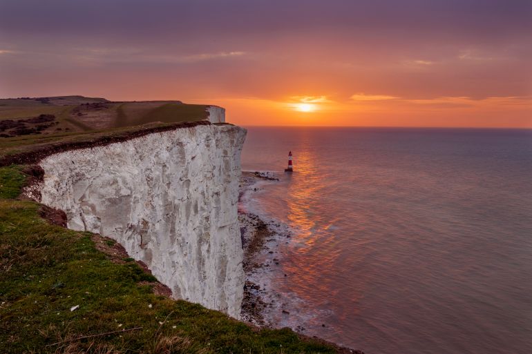 Brilliant sunrise from the cliff edge at Beachy Head East Sussex south east England; Shutterstock ID 1921859543; purchase_order: ajnet; job: ; client: ; other:
