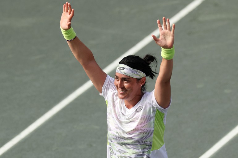 CHARLESTON, SOUTH CAROLINA - APRIL 09: Ons Jabeur of Tunisia celebrates her win over Belinda Bencic of Switzerland during the Finals of the Credit One Charleston Open at Credit One Stadium on April 09, 2023 in Charleston, South Carolina. (Photo by Matthew Stockman/Getty Images)