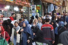 Iranians prepare to celebrate the new year in Tehran