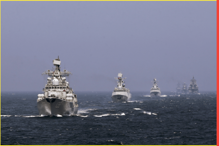 Chinese and Russian naval vessels participate in the Joint Sea-2014 naval drill outside Shanghai on the East China Sea, May 24, 2014. Chinese and Russian navies staged exercises on the East China Sea on Saturday to simulate anti-submarine and search-and-rescue operations. A total of 14 surface ships, two submarines, nine fixed-wing warplanes, six shipboard helicopters and two operational detachments are taking part in this year's week-long drill, state media reported. Picture taken May 24, 2014. REUTERS/China Daily (CHINA - Tags: POLITICS MILITARY) CHINA OUT. NO COMMERCIAL OR EDITORIAL SALES IN CHINA