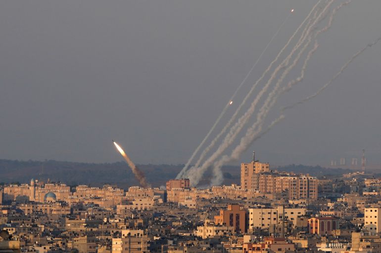 FILE - Rockets are launched from the Gaza Strip towards Israel, in Gaza City, Sunday, Aug. 7, 2022. Close to one-third of the Palestinians who died in the latest outbreak of violence between Israel and Gaza militants may have been killed by errant rockets fired by Islamic Jihad fighters, according to an Israeli military assessment that appears consistent with independent reporting by The Associated Press. (AP Photo/Hatem Moussa, File)