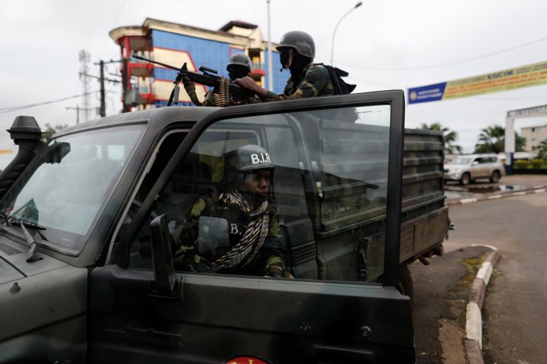 Cameroonian elite Rapid Intervention Battalion (BIR) members keep watch during their patrol in the city of Buea in the anglophone southwest region, Cameroon October 4, 2018. Picture taken October 4, 2018.REUTERS/Zohra Bensemra