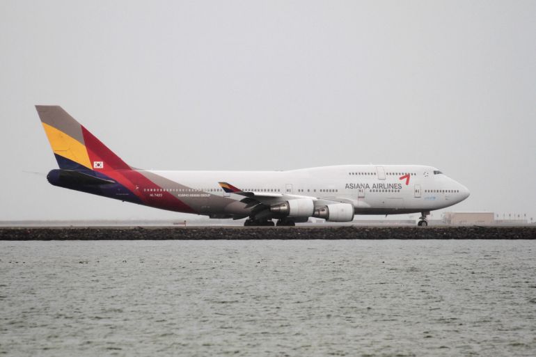 FILE PHOTO: An Asiana Airlines Boeing 747-400 taxis at San Francisco International Airport, San Francisco