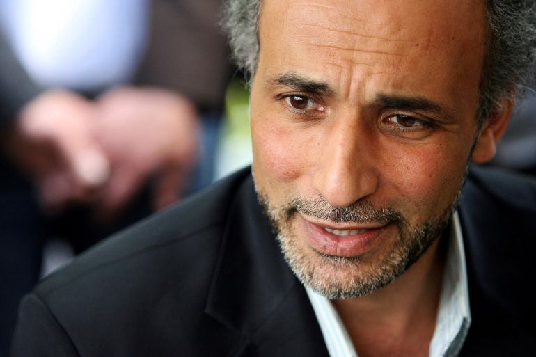 FILE PHOTO: Author Tariq Ramadan talks with a journalist after a conference at the Er-Rahma mosque in Nantes